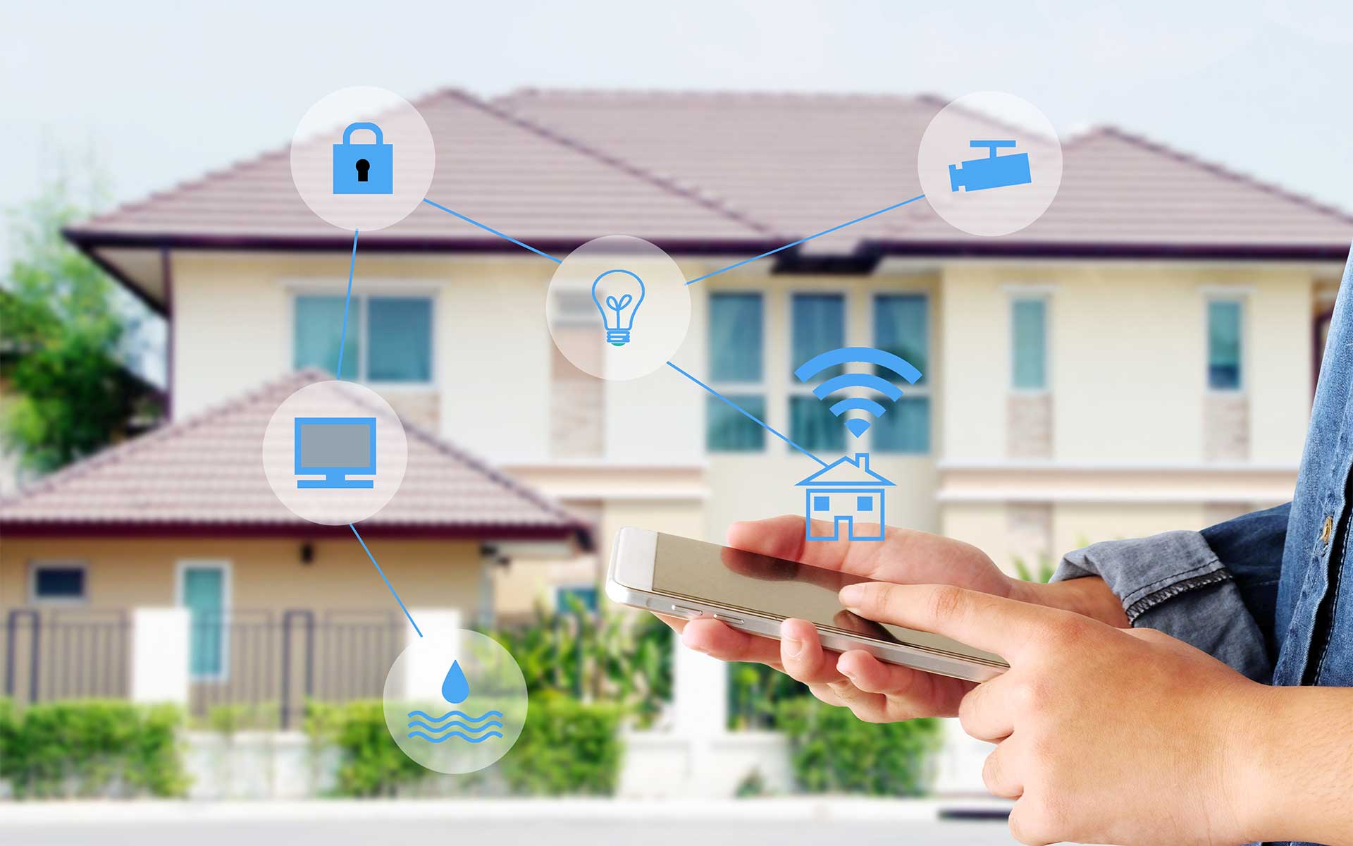 A hand tapping a smartphone, demonstrating how a smart home application controls security features, stands in front of a blurred house background